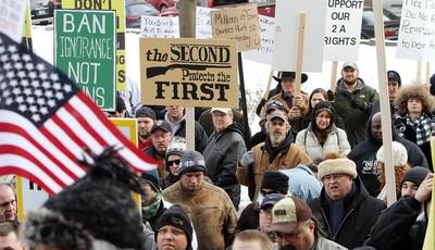 
              Hundreds of gun supporters rally at the Statehouse, Saturday, Jan. 19, 2013 in Concord, N.H.  Rallies are being held by gun rights advocates four days after President Barack Obama unvei